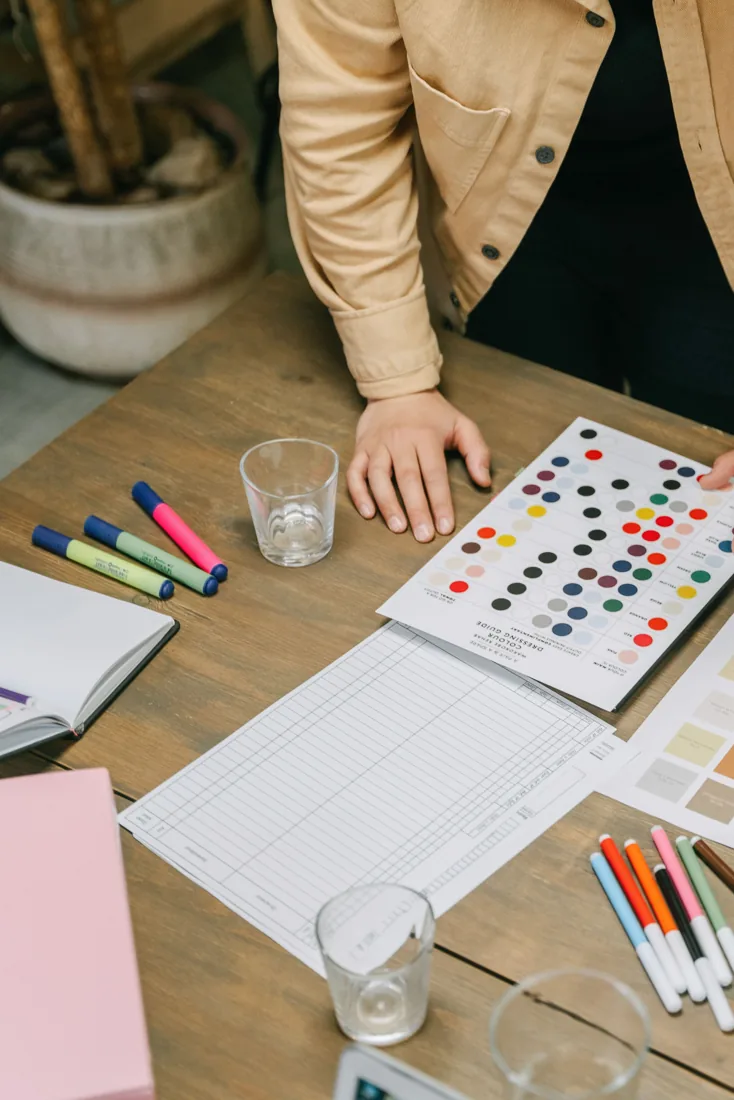 Colour samples and design materials on a worktable